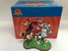 A boxed Wedgwood Looney Tunes 'Teed Off' figure. S