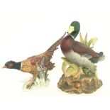 Porcelain figures including a Goebel pheasant and