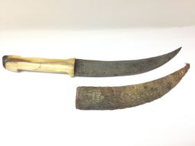 An Antique Islamic knife with fully decorated blad