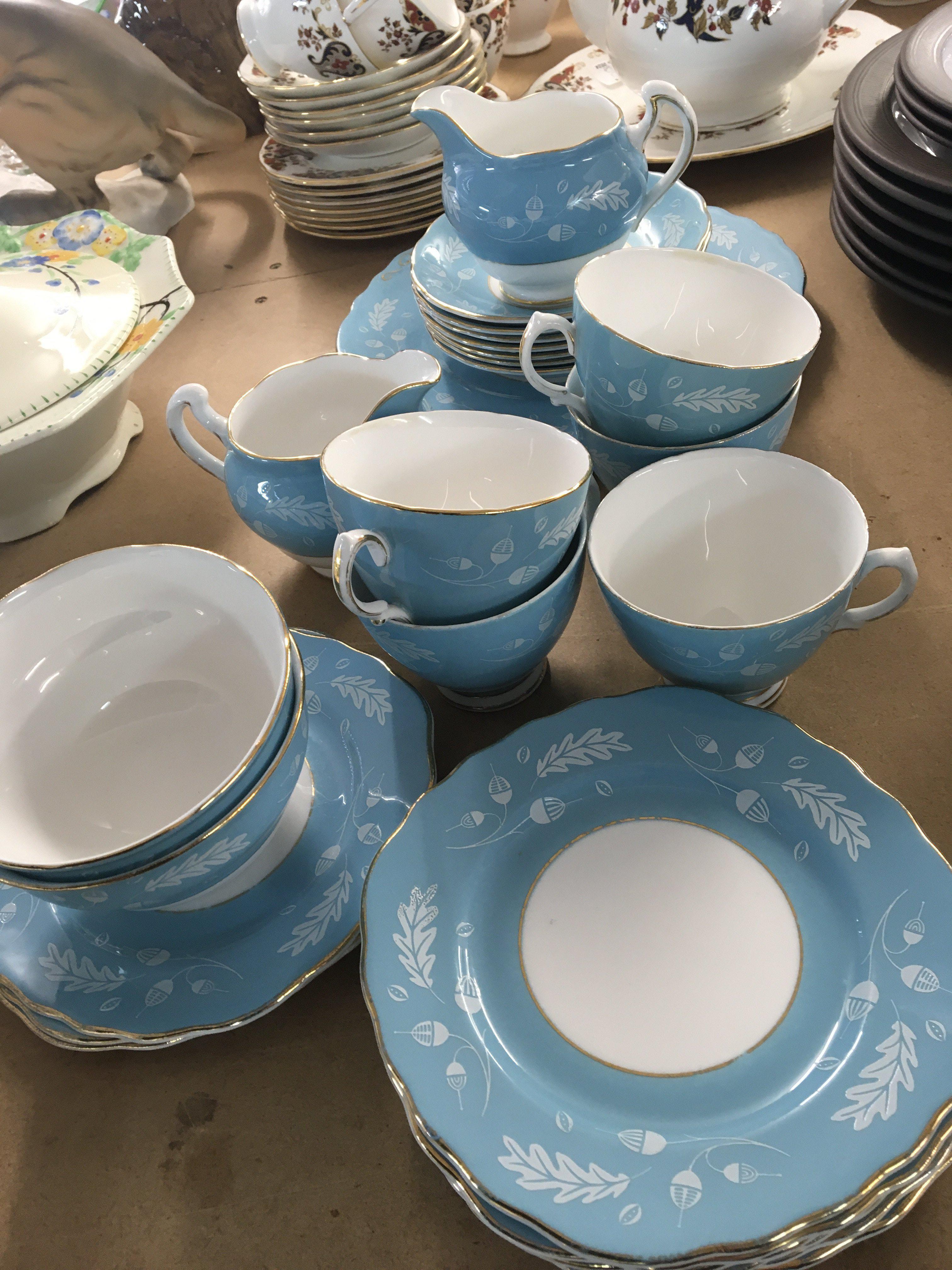 A Colclough bone China tea set decorated with Acorn leaves on a blue and white ground