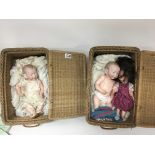 Two Vintage baskets containing two bisque head and