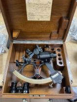 A boxed W Ludolf A G Bremerhaven sextant with bino