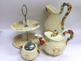 Four Clarice Cliff Harvestware items comprising a