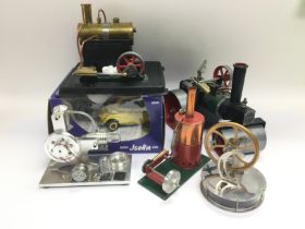 A Mamod steam engine and additional traction units, some N gauge trains and a boxed die cast model