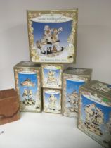 A collection of boxed Regency Fine Art Christmas figures and a vintage boxed Musik Dozen figure (a