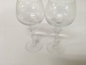 A set of six Art Deco style wine glasses the stems