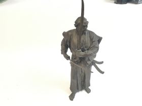 An antique Japanese bronze samurai figurine. Appro