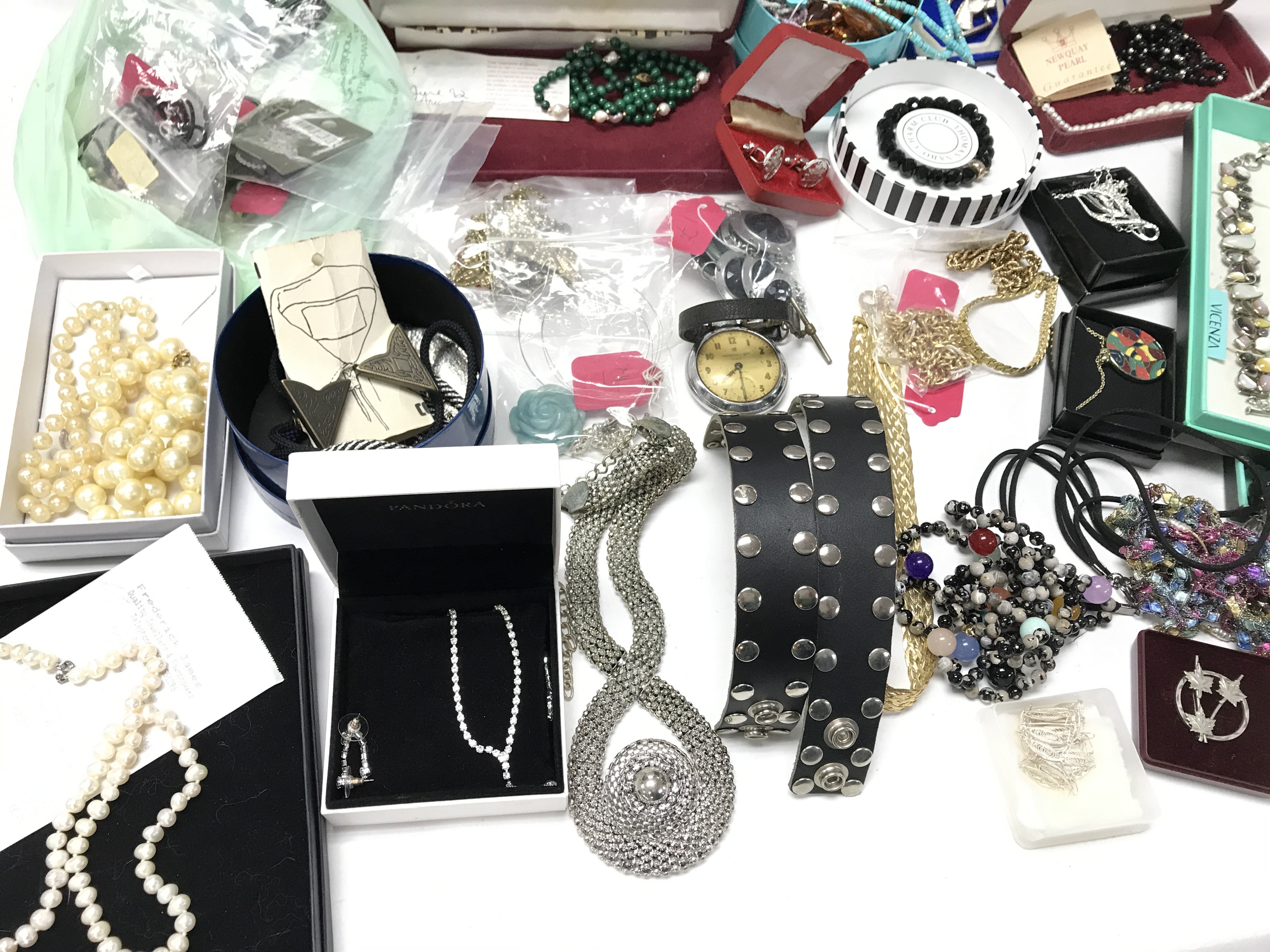 A large collection of costume jewellery including pearls cufflinks bracelet etc. There is a number