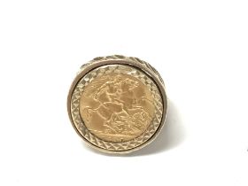 A 1910 half sovereign ring. Ring is 9ct. Total wei
