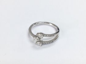 A 10k white gold ring (tested as 9ct) trident styl