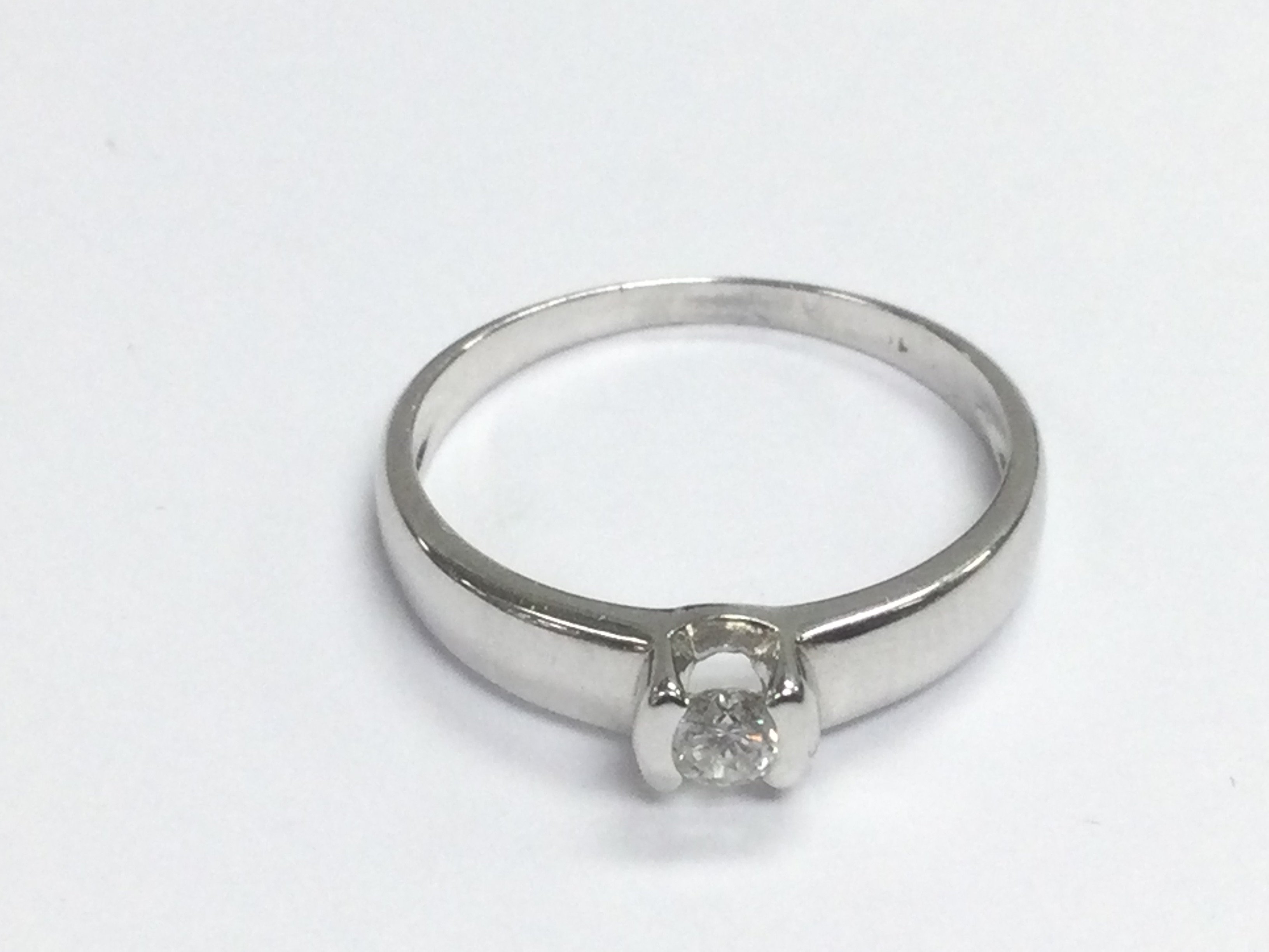 An 18ct white gold solitaire diamond ring, approx