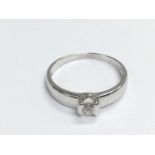 An 18ct white gold solitaire diamond ring, approx