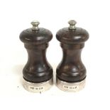 A pair of silver hallmarked and rosewood salt and