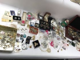 A collection of costume jewellery including some silver and gold items.