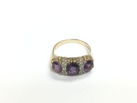 A certificated 9ct gold, oval amethyst and diamond