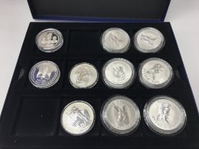 8 1oz silver coins including Britannia's and Austr