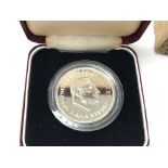 A Sierra Leone 10th anniversary coin with original