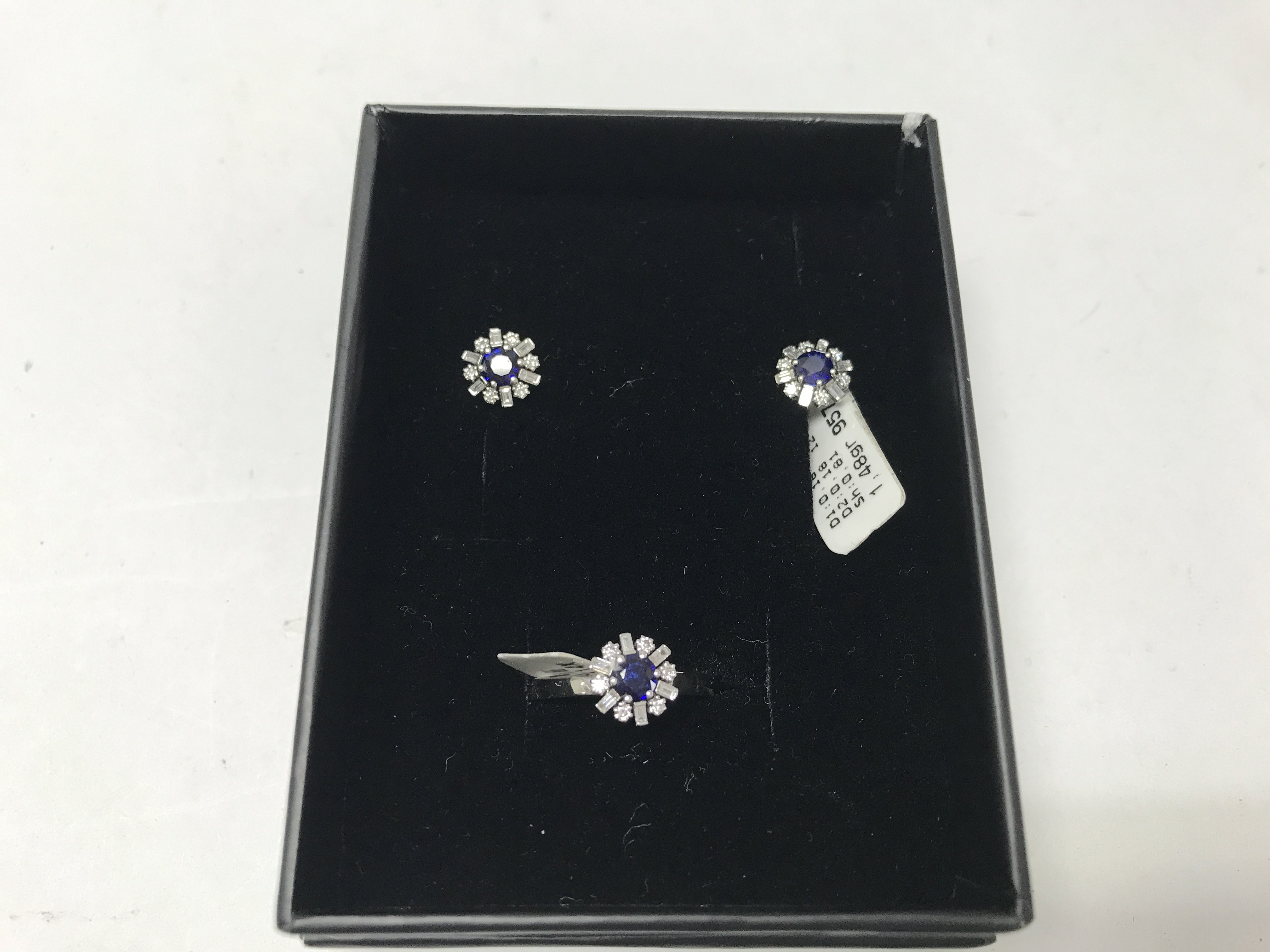 A 14ct white gold diamond and sapphire set of earr