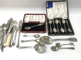 A collection of silver and silver plate cutlery in