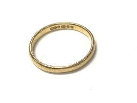 A 22ct gold wedding band. 3.02g size Q