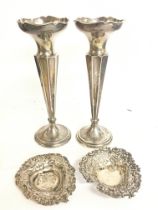 A pair of silver base loaded vases (20cm tall) and