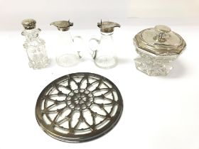 A collection of silver and glass items including whiskey tot a pepper pot 1865 a powder bowel 1922