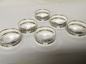 A set of six napkin rings with engraved edges. (6)