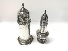 Two silver sugar casters. One from 1900 with Sheff