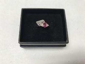 A 14ct gold diamond and Ruby set ring. Approx weig