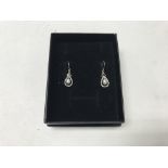 A pair of 9ct white gold Pearl earrings. Shipping