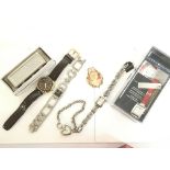 A collection of watches and other items including