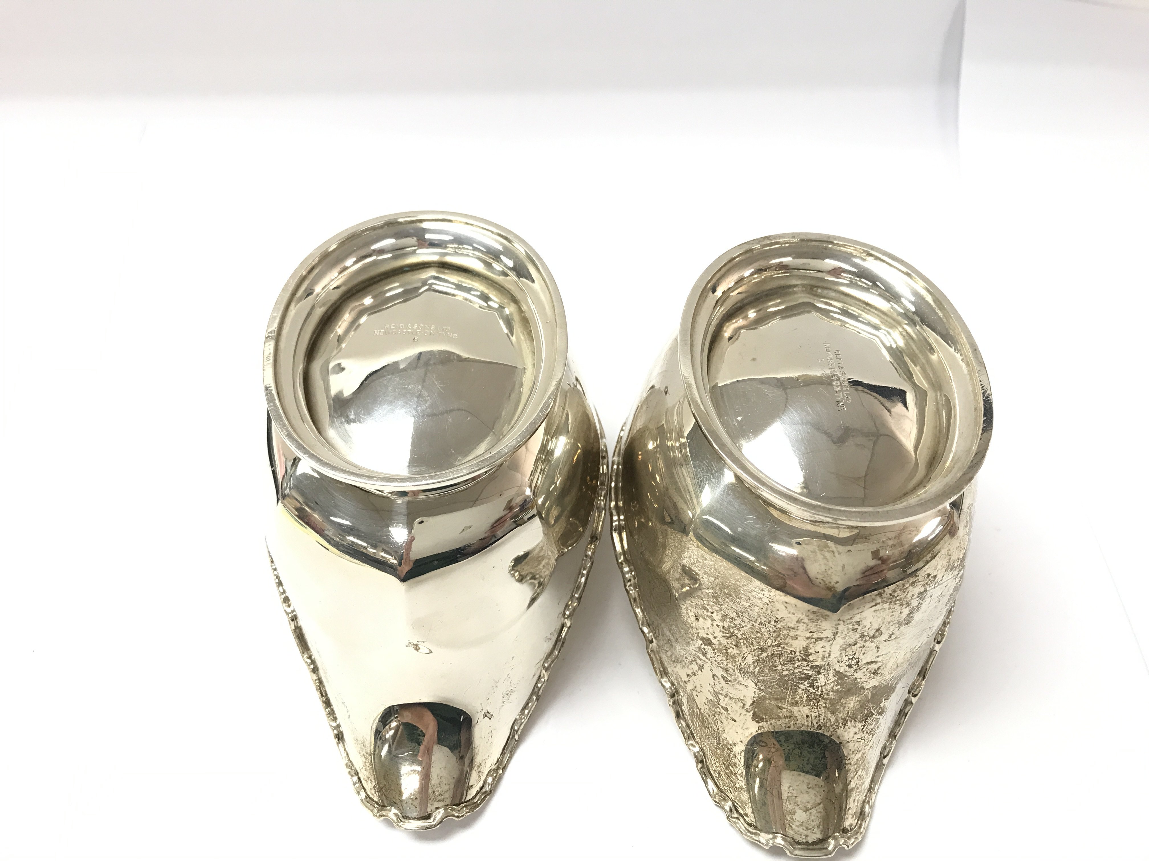 A pair of silver sauce boats with Birmingham hallmarks from 1931/1932 280g. Postage B - Image 3 of 3