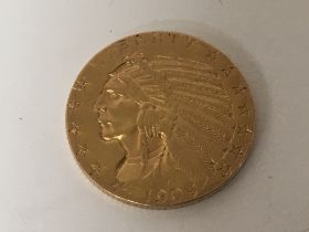 A gold American five dollar coin 1909 weight 8.3g