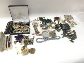 A collection of costume jewellery including watche