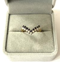 An 18ct gold sapphire and diamond set double row w