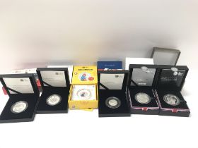 A collection of silver proof coins including Paddi