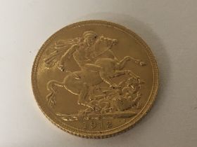 A gold George V 1912 Sovereign