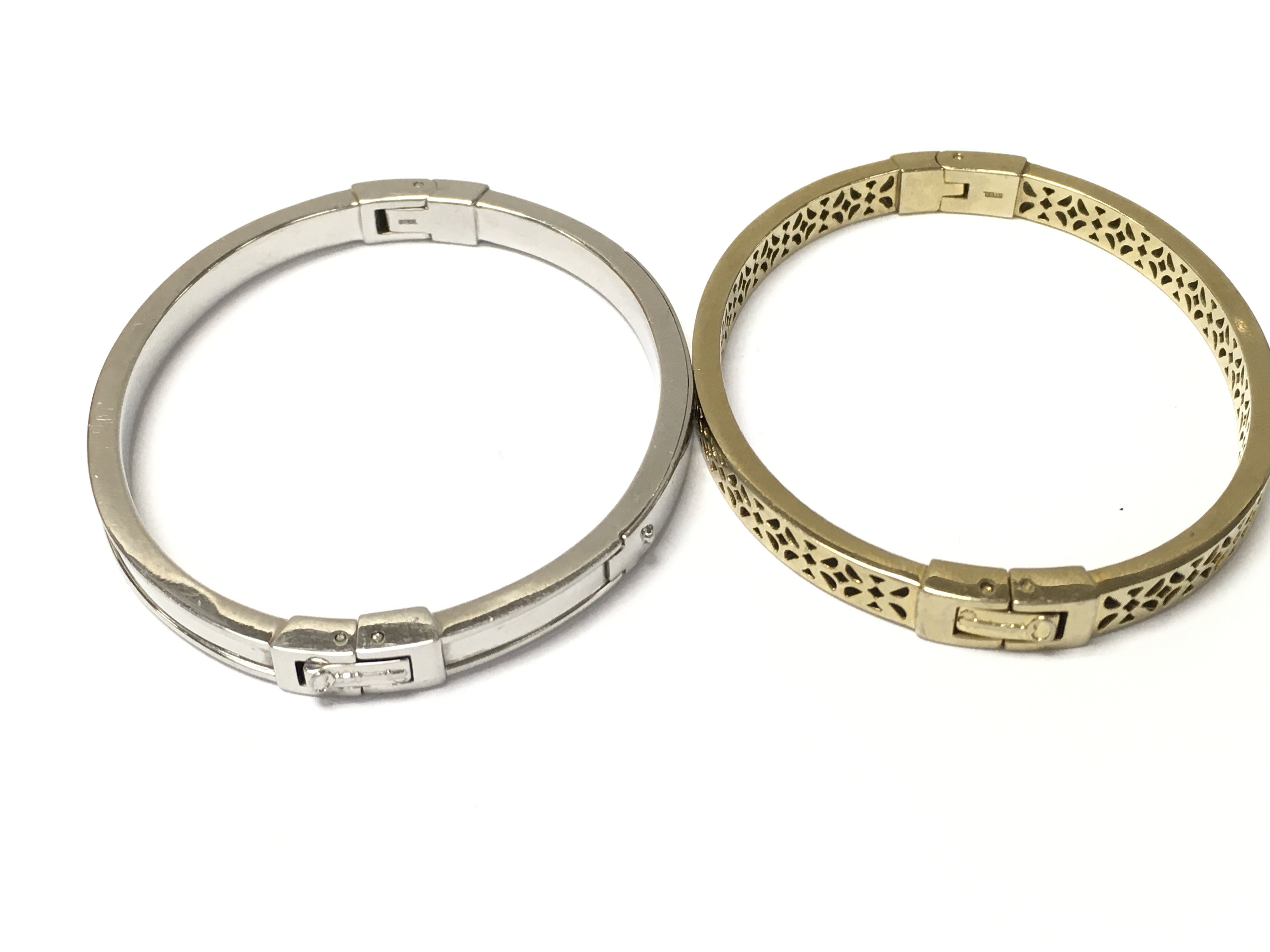 Two bangles by fossil. Approximately 7cm diameter. - Image 2 of 2