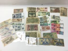 A collection of various bank notes.