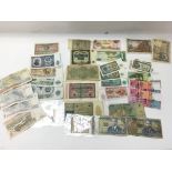 A collection of various bank notes.