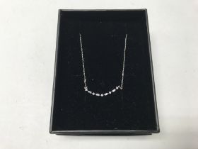 A 14ct white gold necklace set with diamonds appro