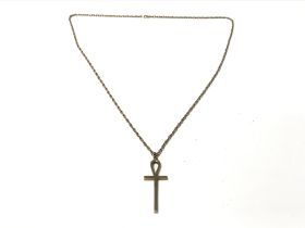 A 9ct gold cross pendant on chain. 10.91g total.