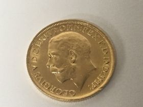 A 1914 George V gold sovereign.