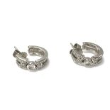 Platinum and diamond hoop earrings. 8.6g