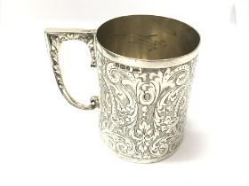 A silver christening mug with Sheffield 1897 hallmarks. Made by Walkers and Hall. 216g 9cm tall