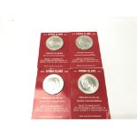 Four silver 1972 25 dollar uncirculated coins in o