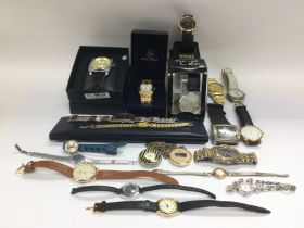 A collection of gents and ladies quartz watches. S