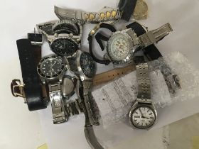 A collection of watches including brand copy watch