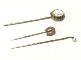 Three vintage stick pins. Postage A