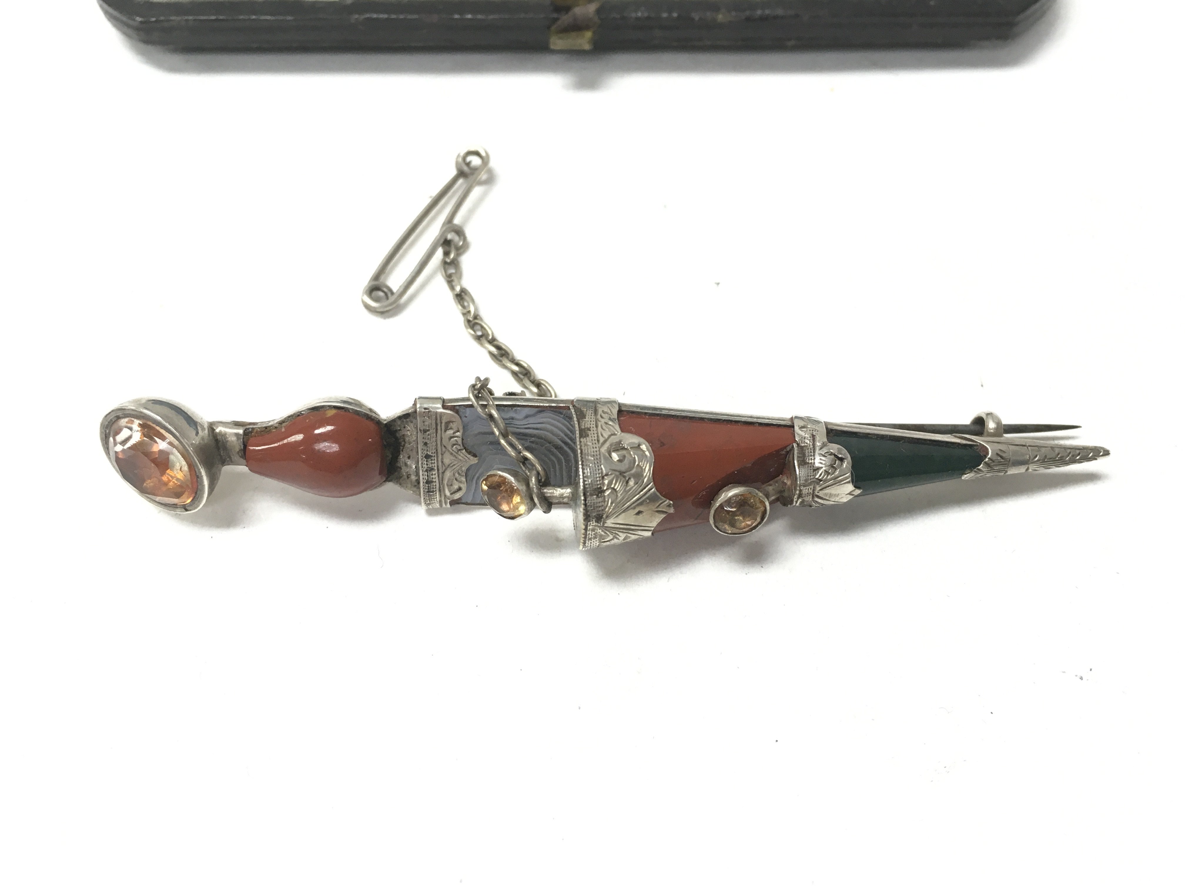 A 19th century Scottish silver and pebble brooch i